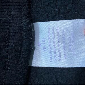 Black fuzzy pants, size M (8-10), worn twice.